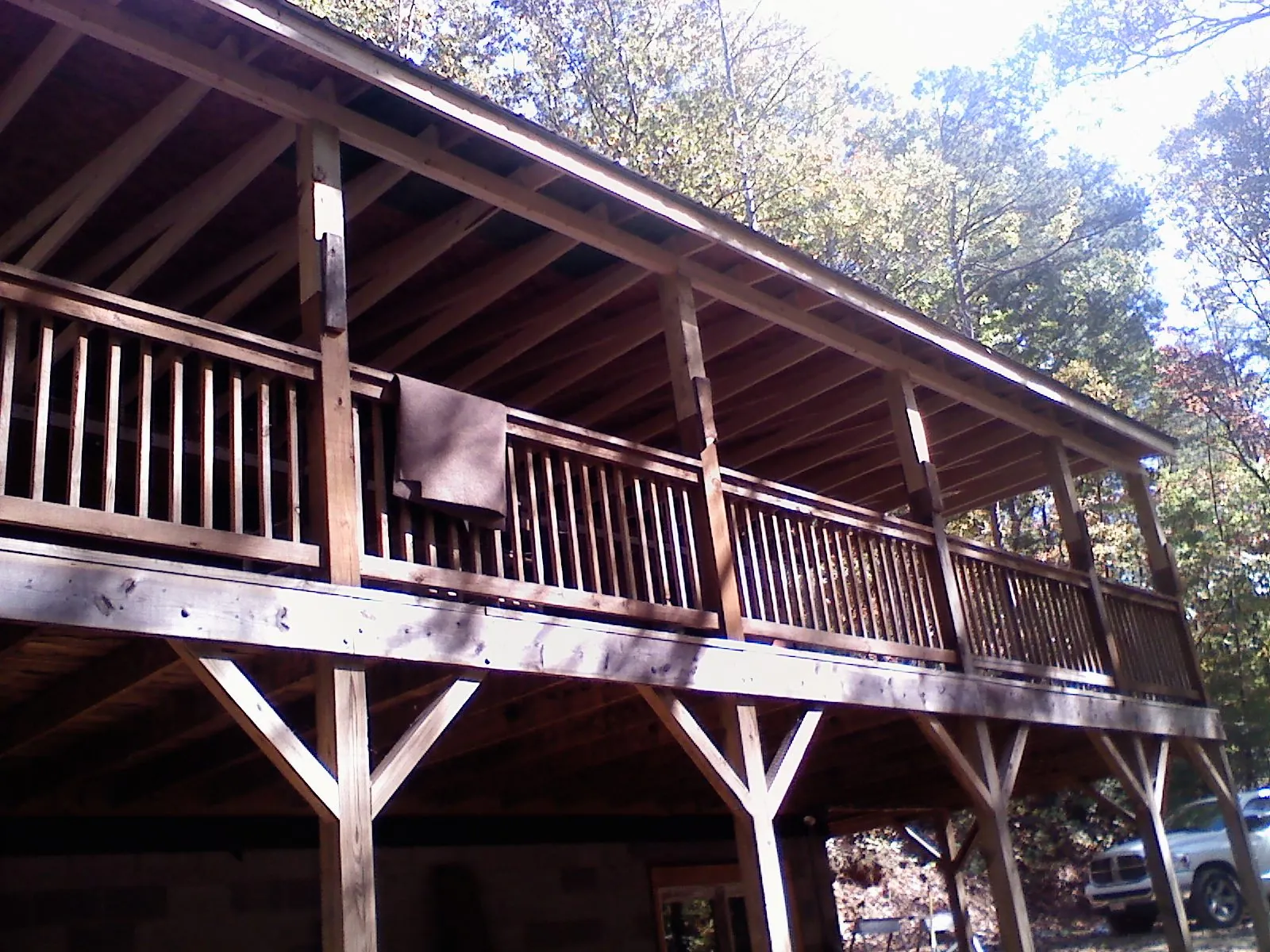 Timber framing under a new elevated porch and deck — Roof Leak Repair in Haw River by Roofing Brothers